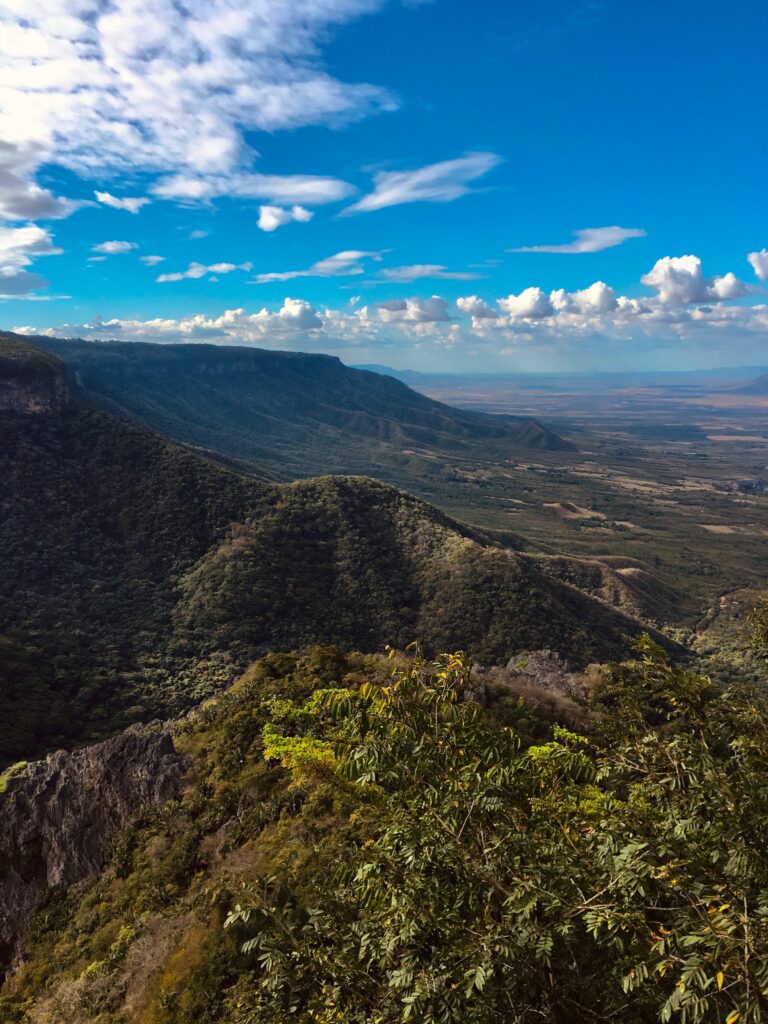 green and brown mountains under blue sky during daytime